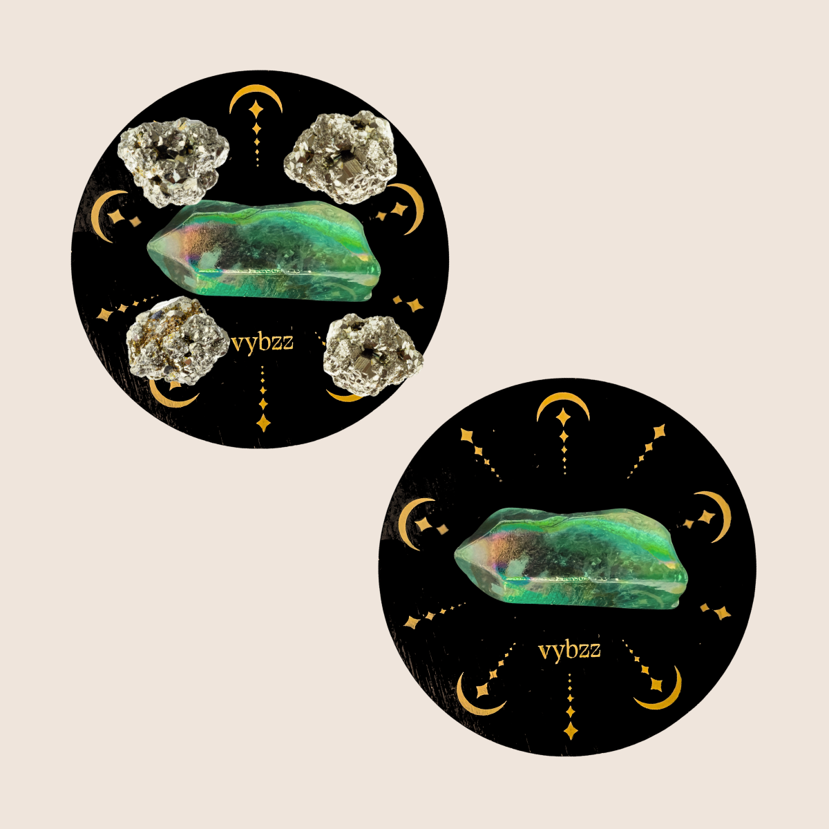 Two black candle lids with gold embossed grids with pyrite and green aura crystal points.