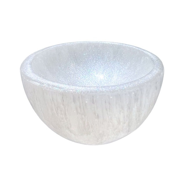 A petite selenite crystal bowl, hand adorned with a custom opalescent finish.