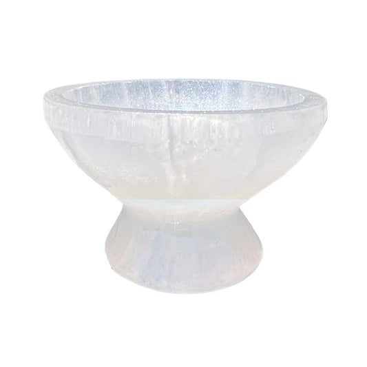 A petite pedestal, selenite crystal bowl, hand adorned with a custom opalescent finish.