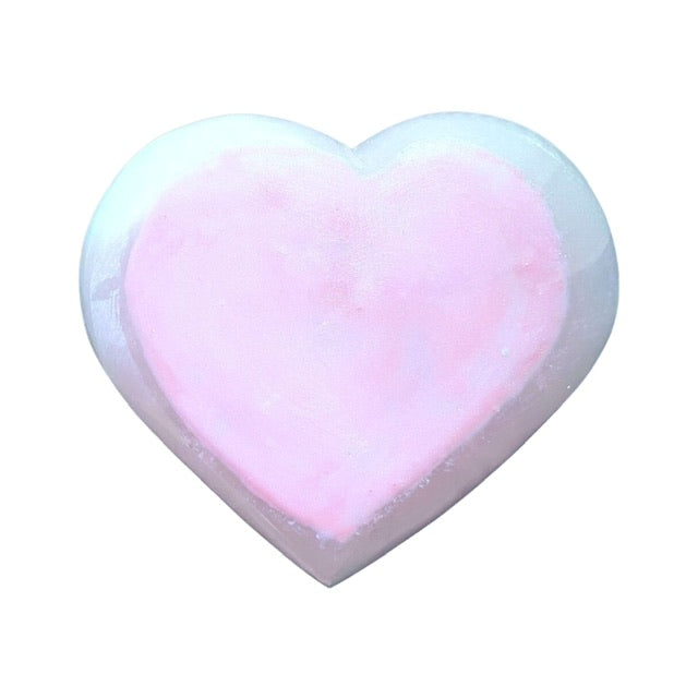 The flip side of a glitzy selenite heart bowl that has been hand painted with a custom opal pink shimmering heart.