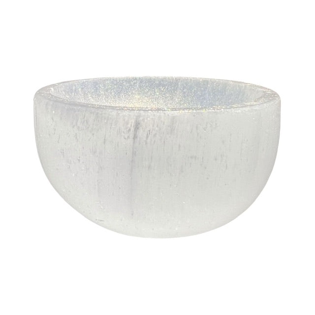 A medium sized selenite crystal bowl, hand adorned with shimmering gold, fairy dust.