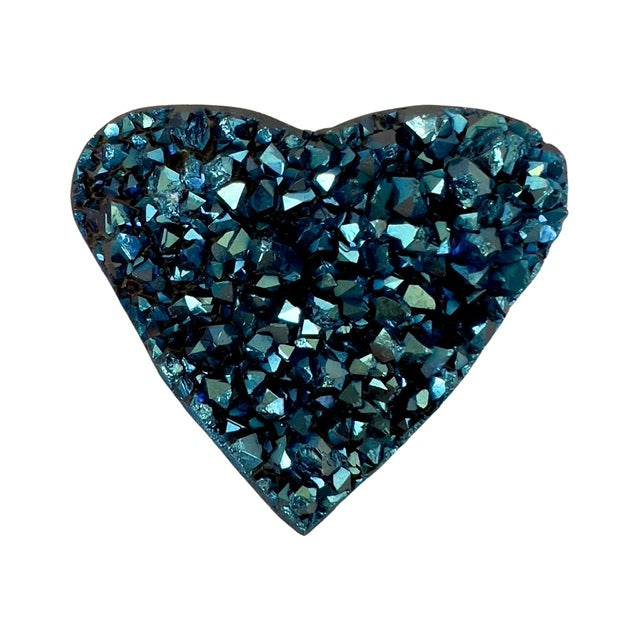 A magical heart shaped, blue titanium, amethyst crystal from Uruguay.