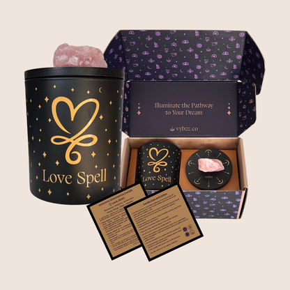 Love Spell candle kit with rose quartz crystal, instruction cards, and decorative gift box