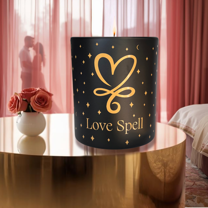 Love Spell soy candle with gold heart design on reflective table, romantic bedroom scene