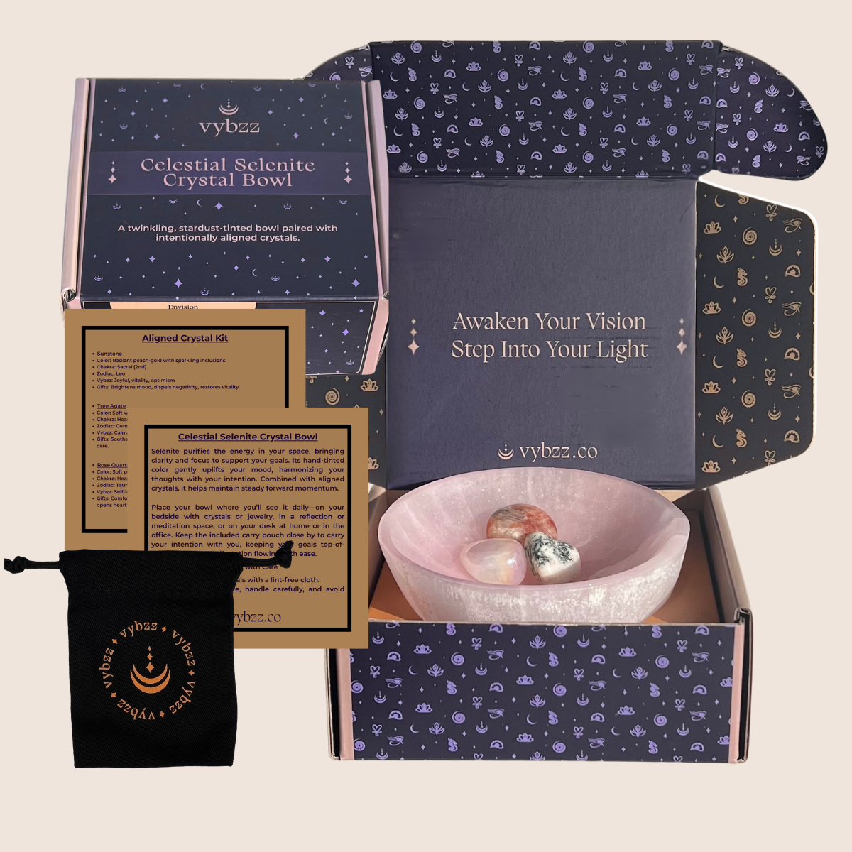 Vybzz Soul Soothing Celestial Selenite Crystal Bowl tinted ruby shimmer  with rose quartz aura, tree agate and sunstone crystals. Shown in branded box with product information cards.