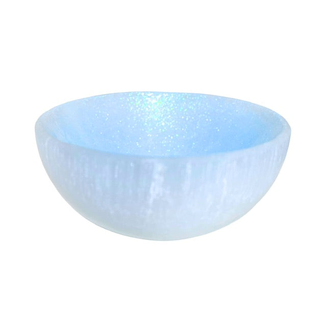 The top view of a large glam selenite crystal bowl, hand adorned with a sky blue finish.