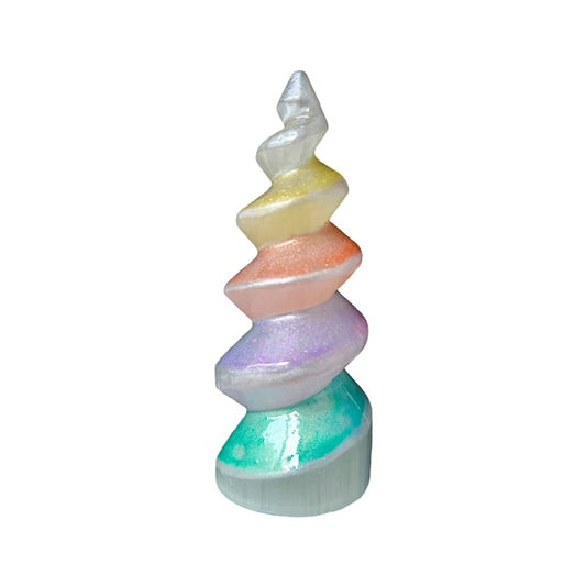 A hand-decorated selenite crystal unicorn horn in a mesmerizing pastel rainbow of colors. Front view.