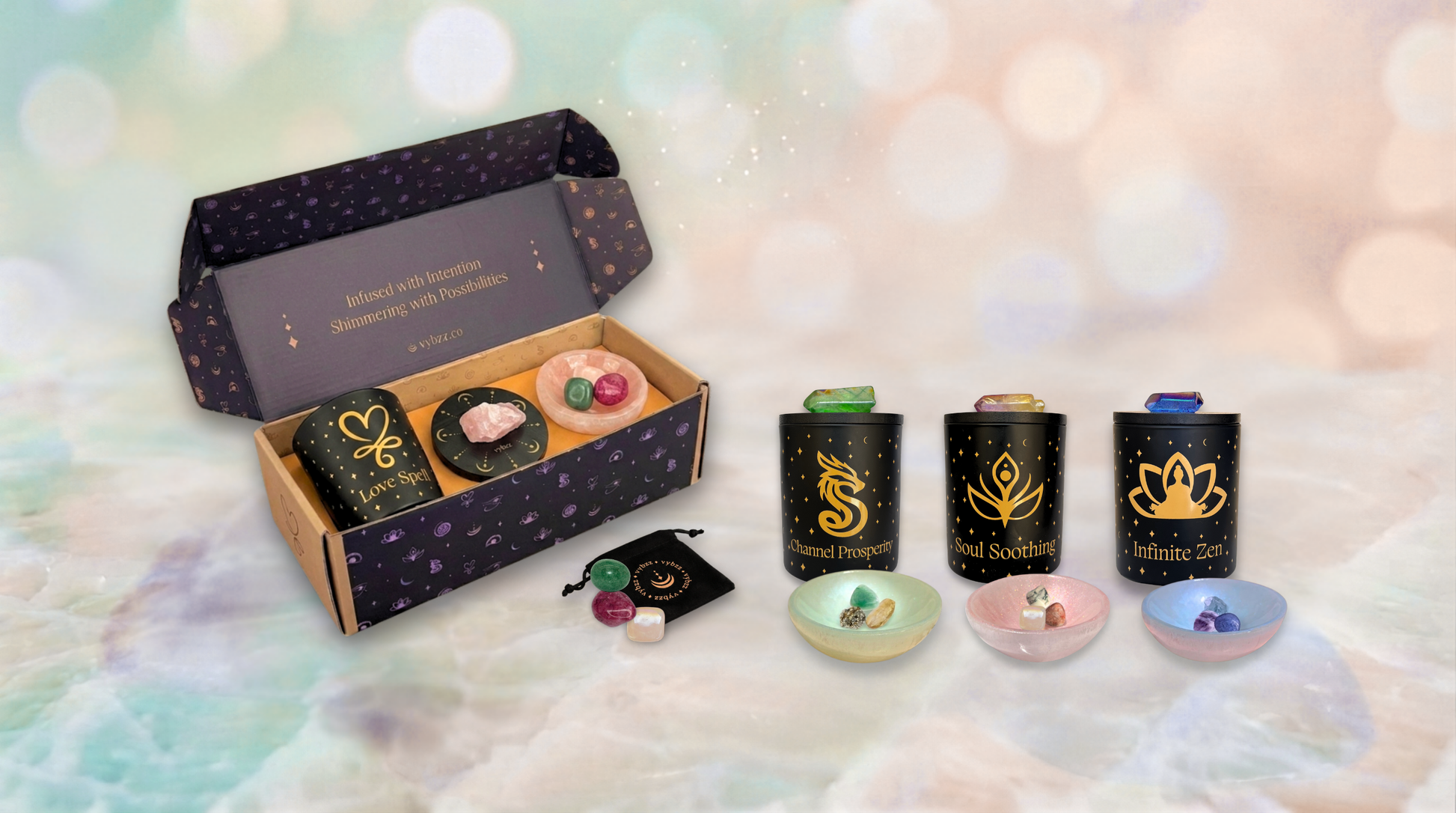 Open premium-size Manifestation Kit gift box featuring Love Spell Aromatherapy Intention Candle, crystal grid, and Selenite Bowl with crystals; other kits include Channel Prosperity, Soul Soothing, and Infinite Zen.