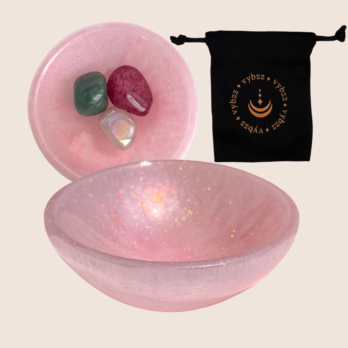 Rose tinted selenite crystal bowls side and top view, including crystals and carry pouch.