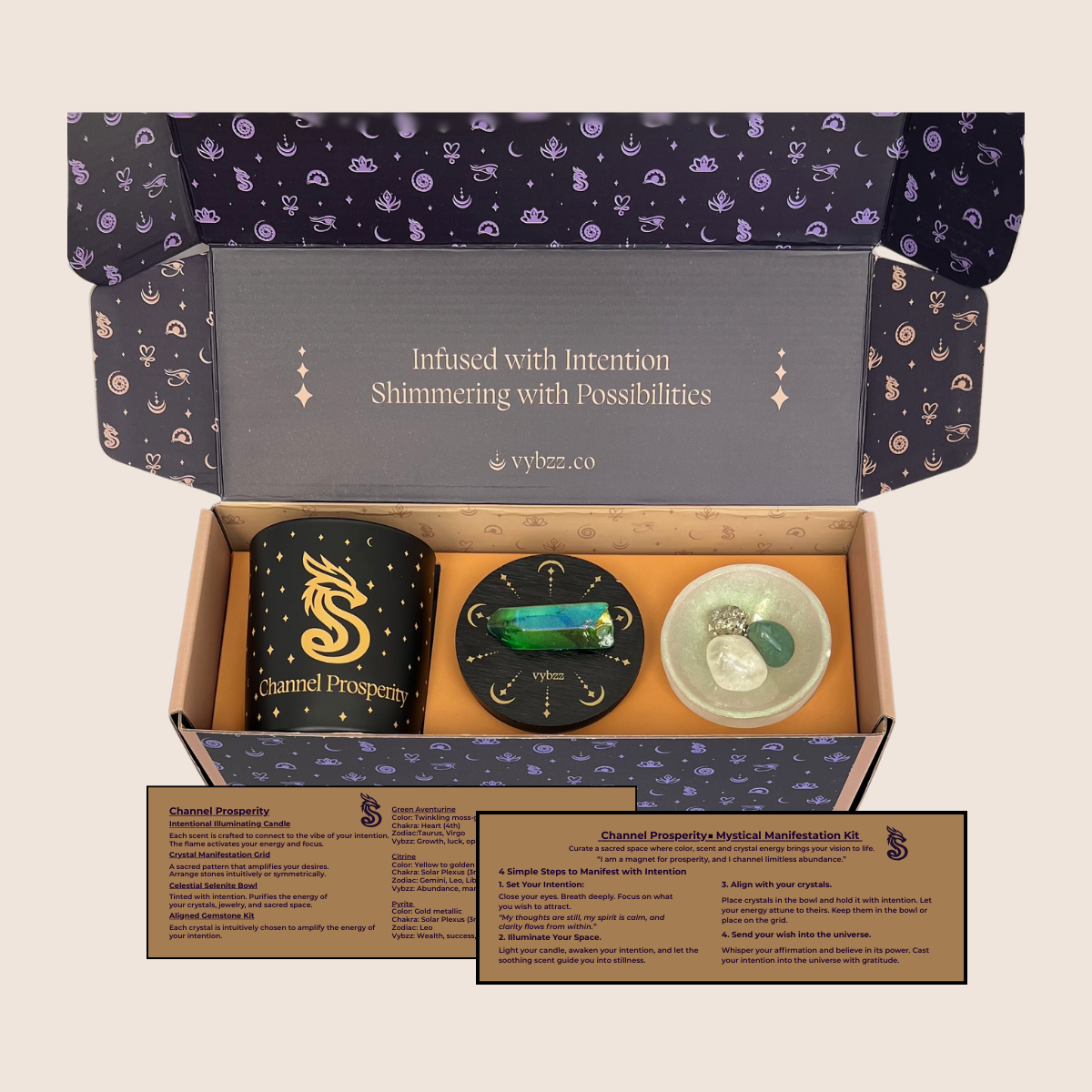 Channel prosperity intention kit gift box with aromatherapy candle, selenite bowl and pyrite, green aventurine and citrine crystals.