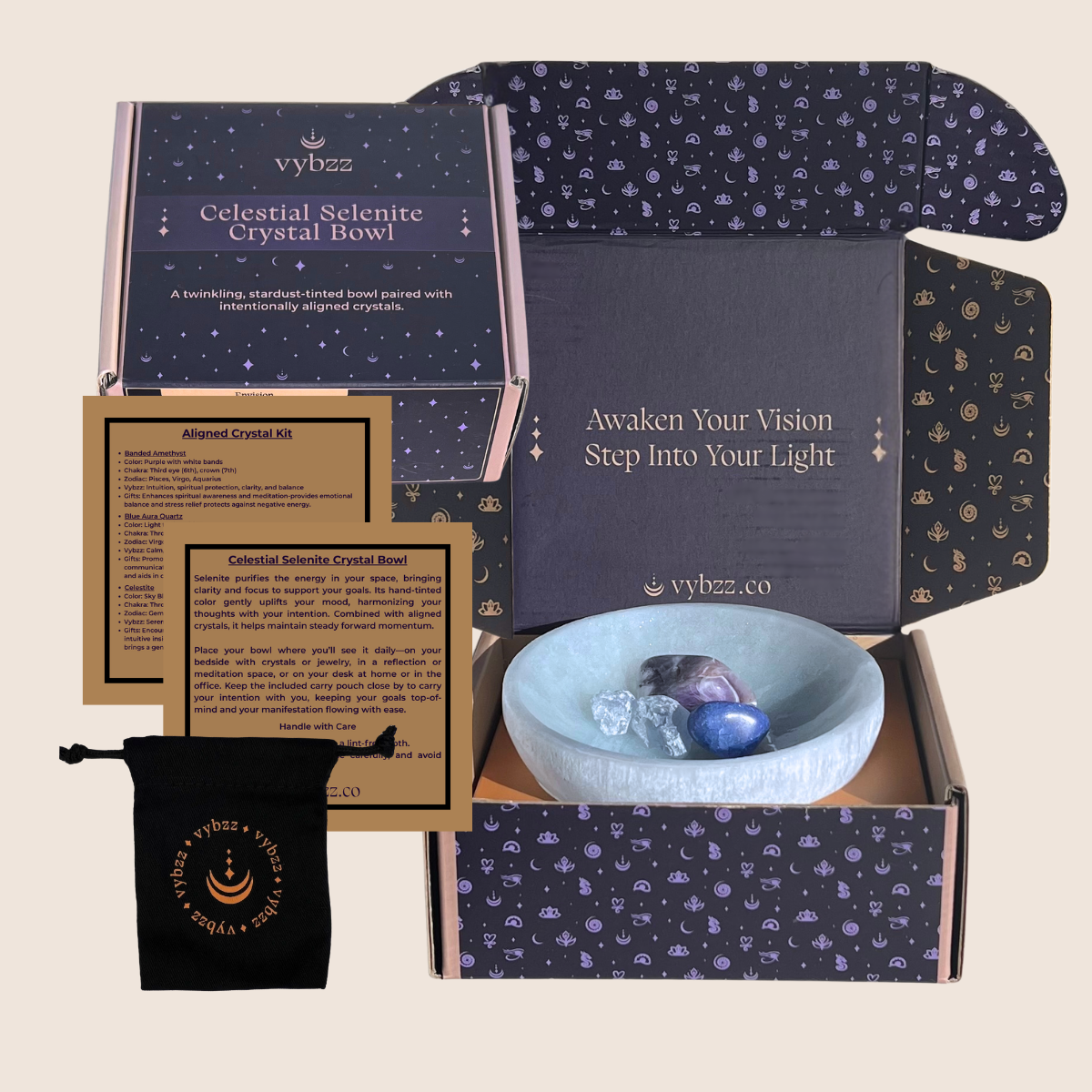 Blue  Zen Celestial Selenite Crystal Bowl with Banded Amethyst, Celestite and blue aura Quartz crystals. Displayed in branded box with product information cards.