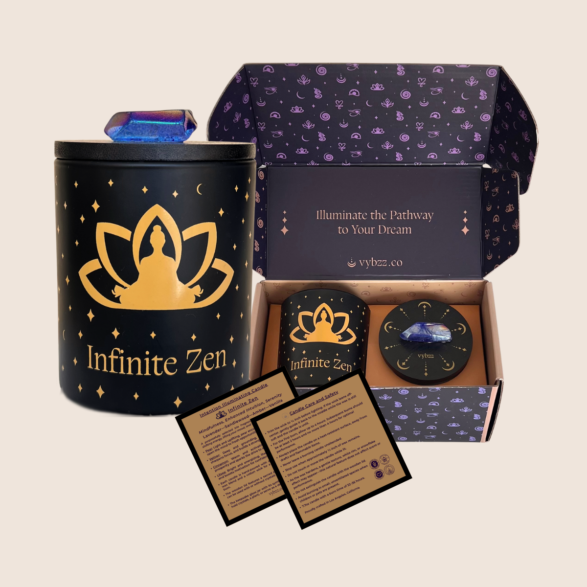 Intention Illuminating Infinite Zen soy candle set with blue aura crystal on lid, branded gift box, and product care cards.